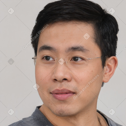 Neutral asian young-adult male with short  black hair and brown eyes