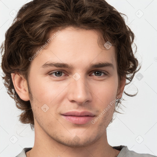 Joyful white young-adult male with medium  brown hair and brown eyes