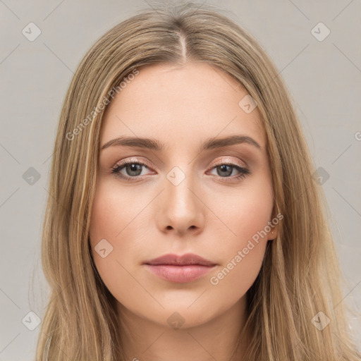 Neutral white young-adult female with long  brown hair and brown eyes