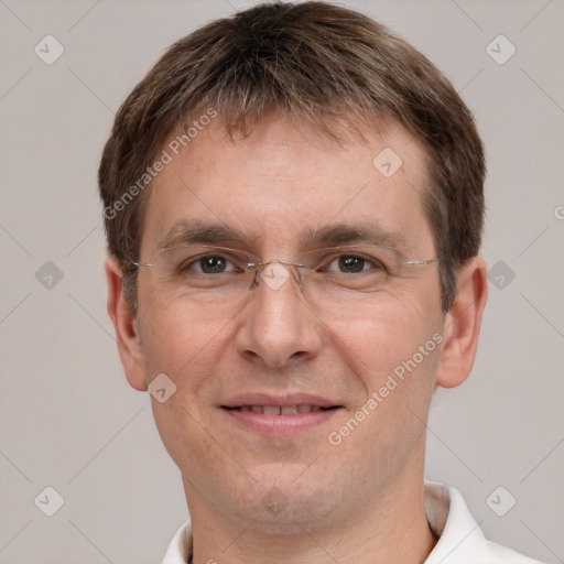 Joyful white adult male with short  brown hair and grey eyes