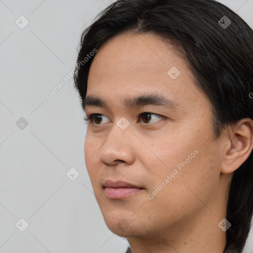 Neutral asian young-adult male with short  black hair and brown eyes