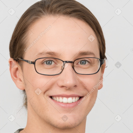 Joyful white adult female with short  brown hair and grey eyes