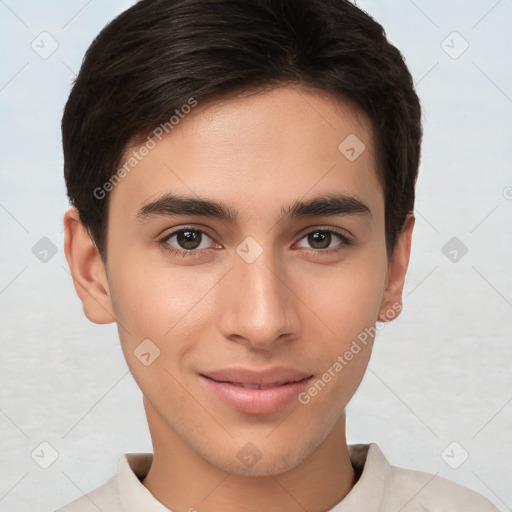 Joyful white young-adult male with short  brown hair and brown eyes