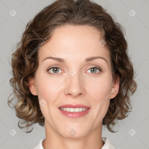 Joyful white young-adult female with medium  brown hair and green eyes