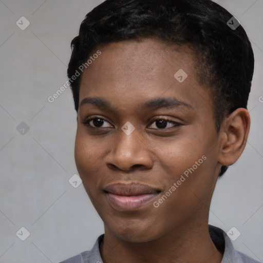 Joyful black young-adult female with short  black hair and brown eyes