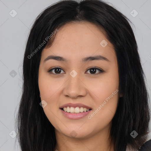 Joyful asian young-adult female with long  brown hair and brown eyes