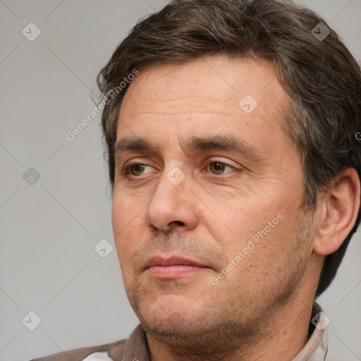 Neutral white adult male with short  brown hair and brown eyes