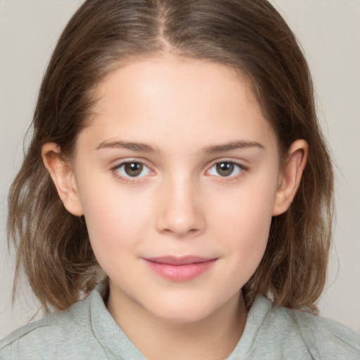 Joyful white child female with medium  brown hair and brown eyes