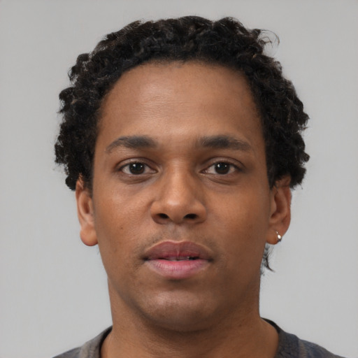 Neutral black young-adult male with short  brown hair and brown eyes