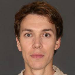 Neutral white adult male with short  brown hair and brown eyes