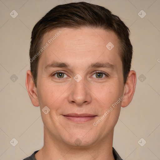 Joyful white adult male with short  brown hair and grey eyes