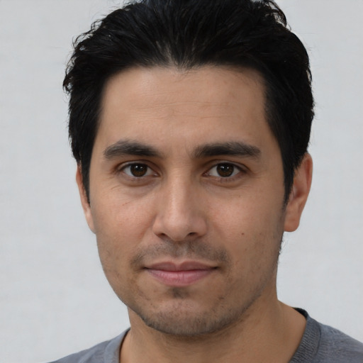 Neutral asian young-adult male with short  black hair and brown eyes