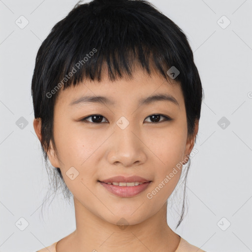 Joyful asian young-adult female with medium  black hair and brown eyes