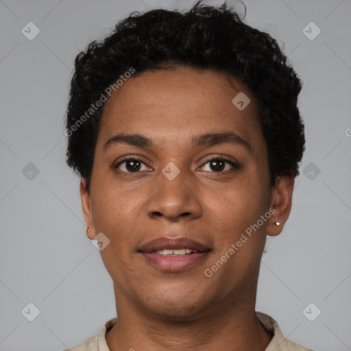 Joyful black young-adult male with short  black hair and brown eyes