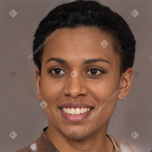 Joyful latino young-adult female with short  black hair and brown eyes