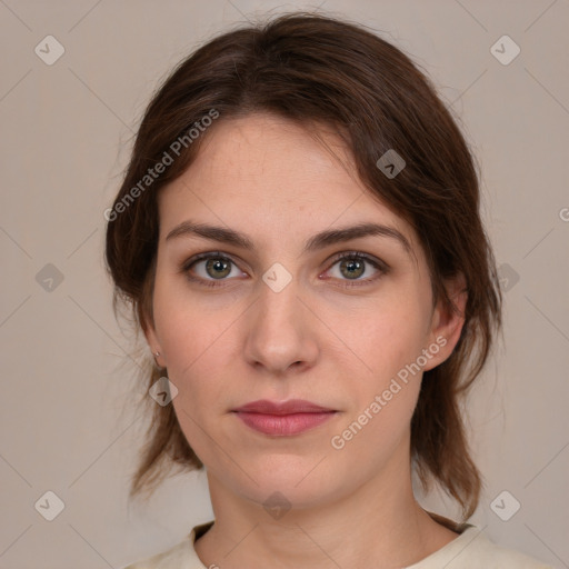 Neutral white young-adult female with medium  brown hair and green eyes