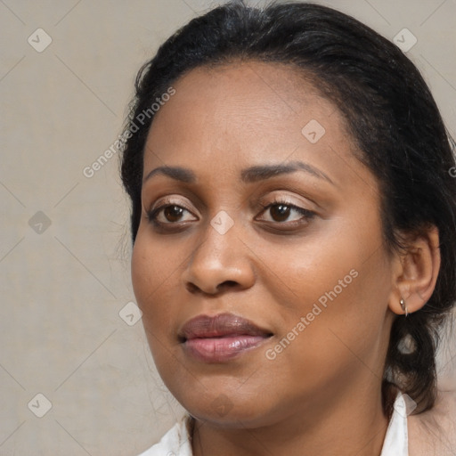 Joyful black young-adult female with medium  brown hair and brown eyes