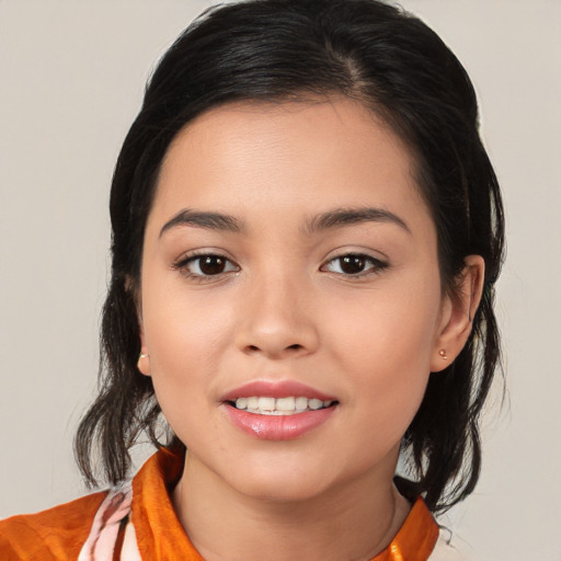 Joyful white young-adult female with medium  brown hair and brown eyes