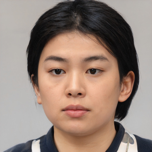 Neutral asian young-adult female with medium  black hair and brown eyes
