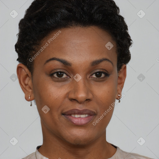 Joyful black young-adult female with short  brown hair and brown eyes