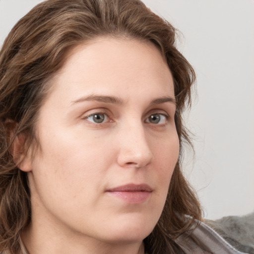 Neutral white young-adult female with long  brown hair and grey eyes