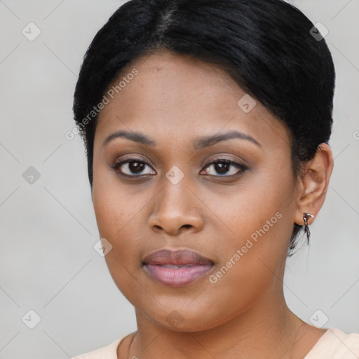 Joyful asian young-adult female with short  black hair and brown eyes