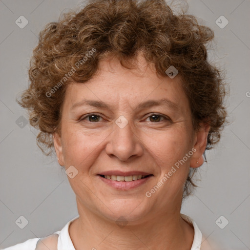 Joyful white adult female with short  brown hair and brown eyes