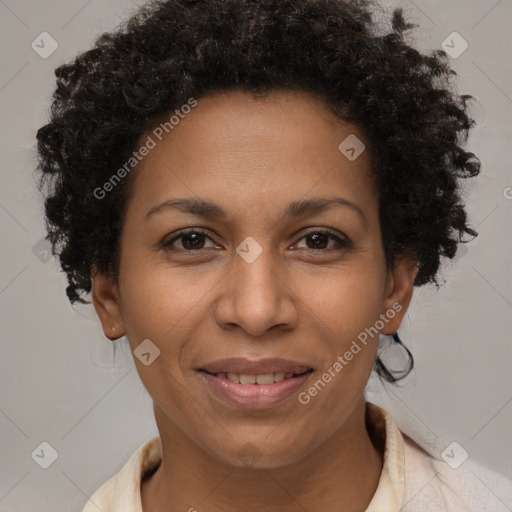 Joyful black adult female with short  brown hair and brown eyes