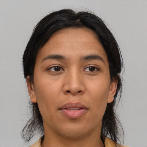 Joyful asian young-adult female with medium  brown hair and brown eyes