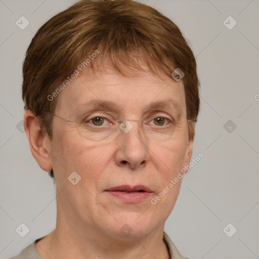 Joyful white adult female with short  brown hair and grey eyes