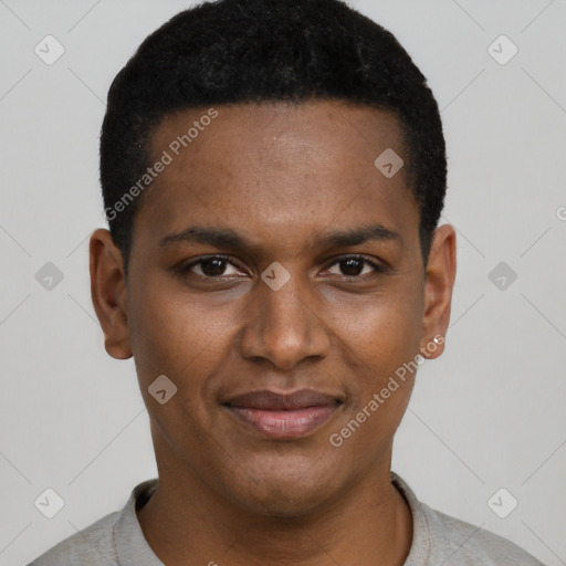 Joyful black young-adult male with short  brown hair and brown eyes