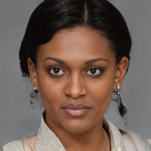 Neutral black young-adult female with medium  black hair and brown eyes