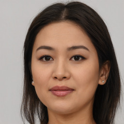 Joyful asian young-adult female with medium  brown hair and brown eyes