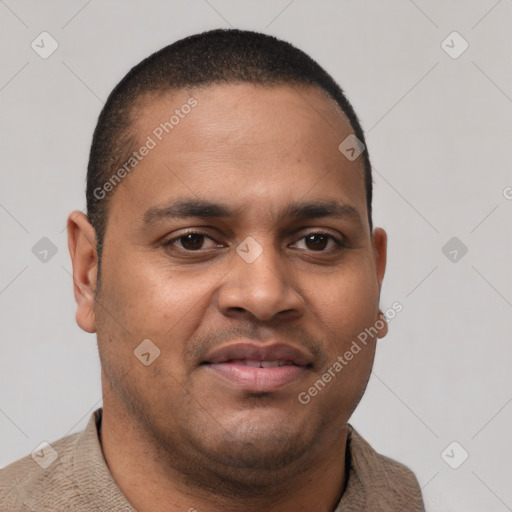 Joyful latino young-adult male with short  brown hair and brown eyes