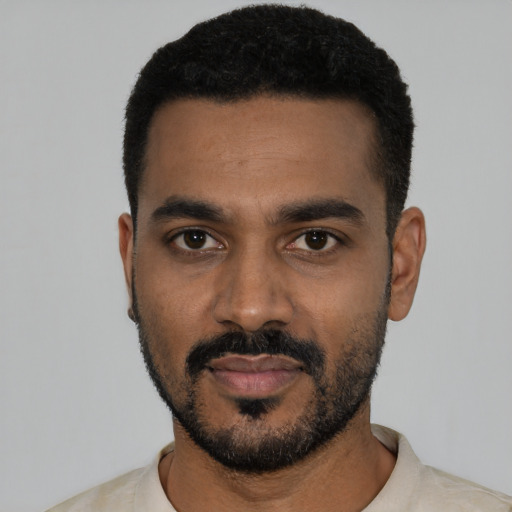 Neutral black young-adult male with short  black hair and brown eyes