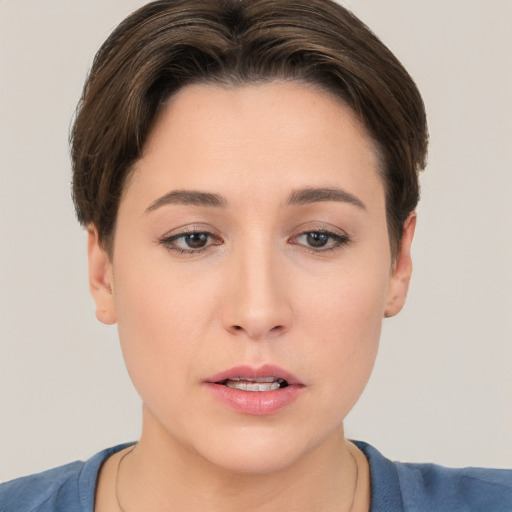 Neutral white young-adult female with short  brown hair and brown eyes