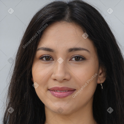 Joyful latino young-adult female with long  brown hair and brown eyes