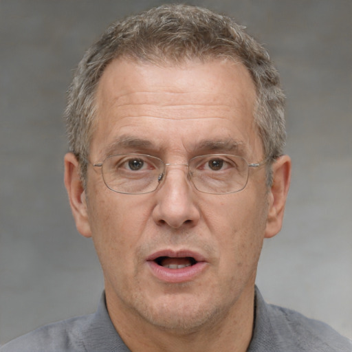 Neutral white middle-aged male with short  brown hair and brown eyes