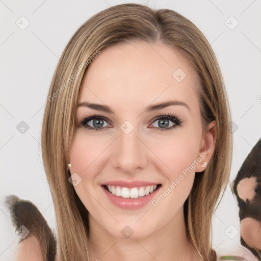 Joyful white young-adult female with medium  brown hair and green eyes