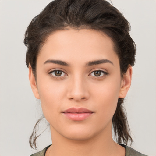 Neutral white young-adult female with medium  brown hair and brown eyes