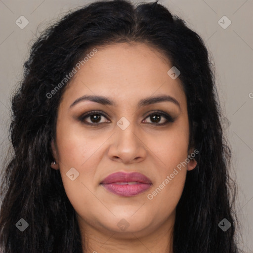 Joyful latino young-adult female with long  brown hair and brown eyes