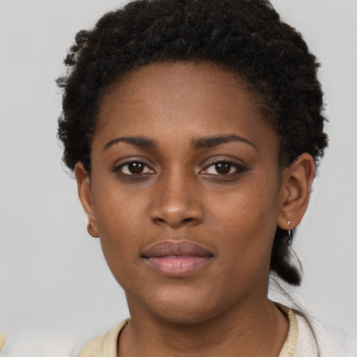 Neutral black young-adult female with short  brown hair and brown eyes