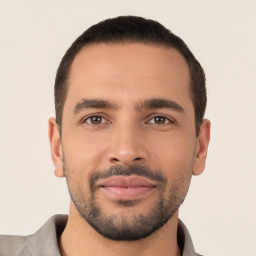 Neutral white young-adult male with short  black hair and brown eyes