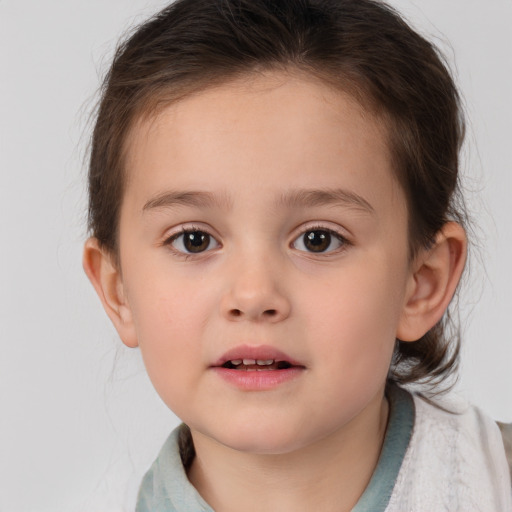 Neutral white child female with medium  brown hair and brown eyes