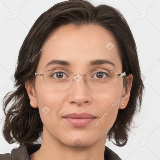 Joyful white adult female with medium  brown hair and brown eyes