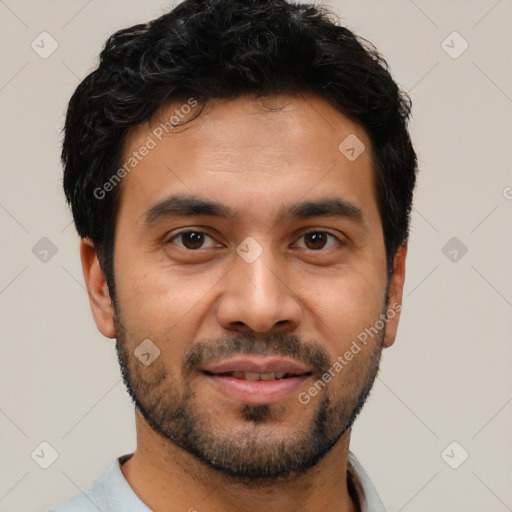 Joyful white young-adult male with short  black hair and brown eyes