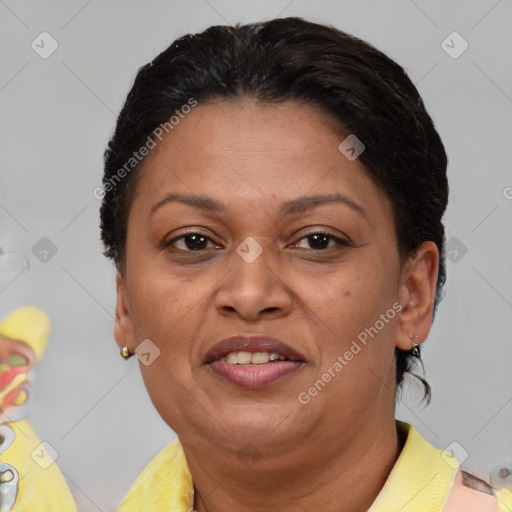 Joyful asian adult female with short  brown hair and brown eyes