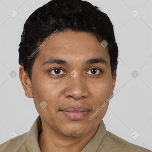 Joyful latino young-adult male with short  black hair and brown eyes