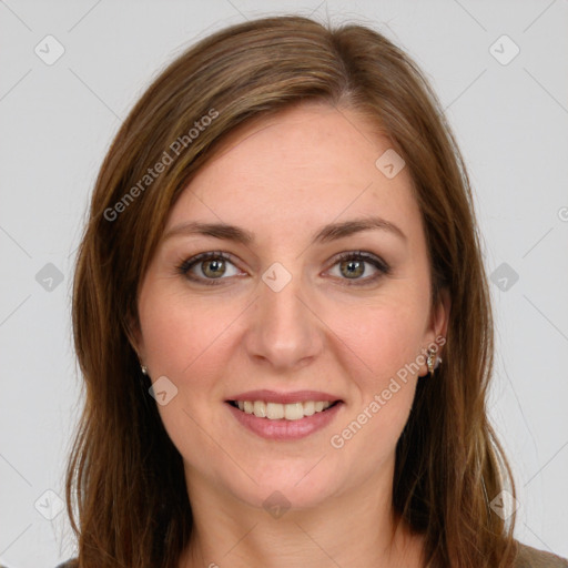 Joyful white young-adult female with long  brown hair and green eyes