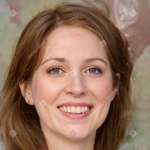 Joyful white adult female with medium  brown hair and grey eyes